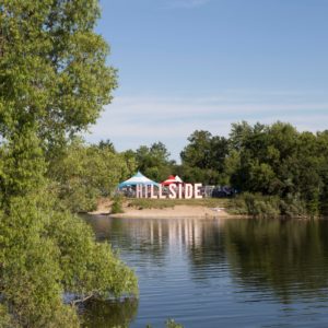 Hillside sign across the water